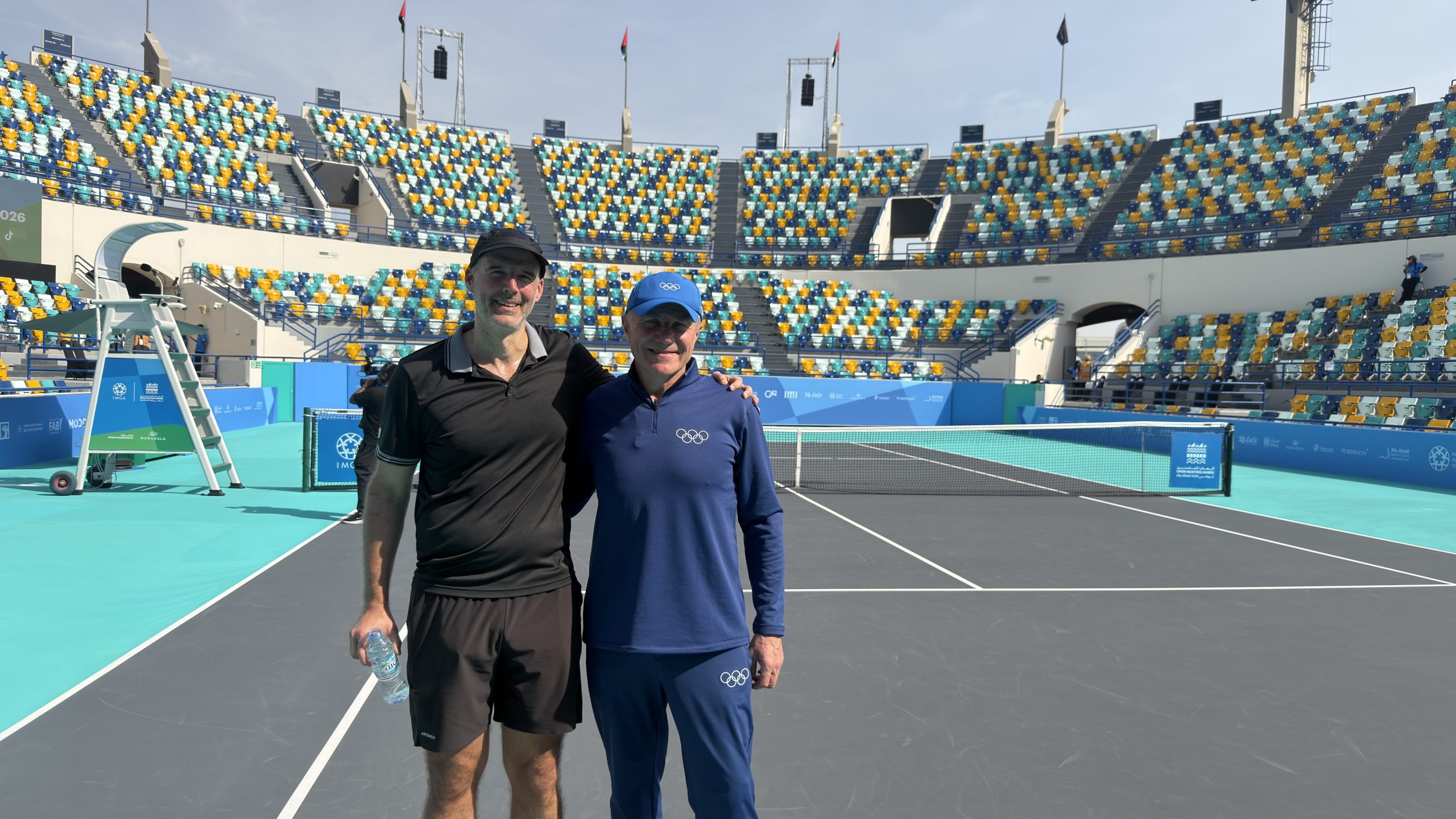 IMGA Leadership celebrating athletes and Board member Alex Mc Lin competing on court